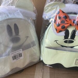 LOUNGEFLY MICKEY and MINNIE GLOW BACKPACKS  NWT